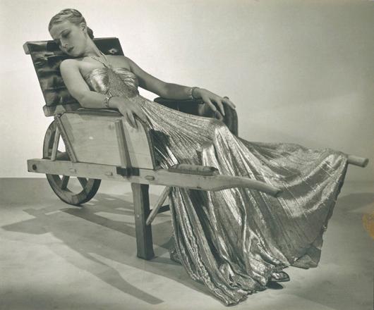 Man Ray Model in Dominguez' wheelbarrow, 1937