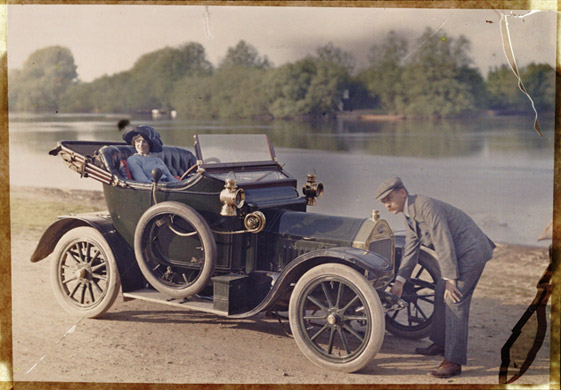 Young couple with motor car