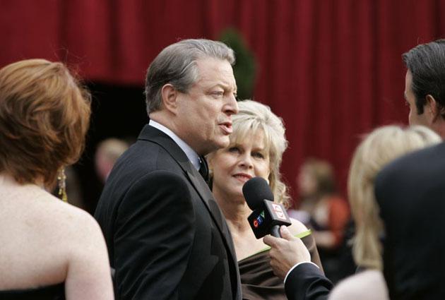 Former vice president Al Gore and his wife Tipper. Mr Gore's film An Inconvenient Truth is nominated in the documentary category. We don't expect him to do a Michael Moore.