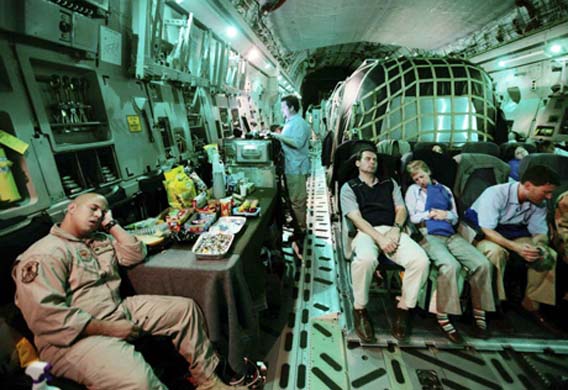 Laura Bush and secret service in a plane