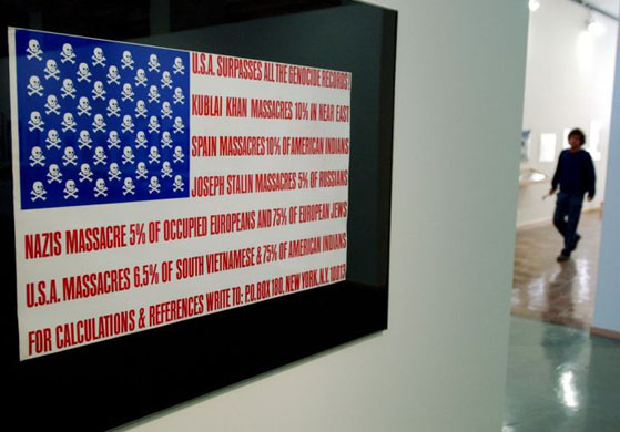 USA surpasses all the genocide records , a placard by American artist George Maciunas