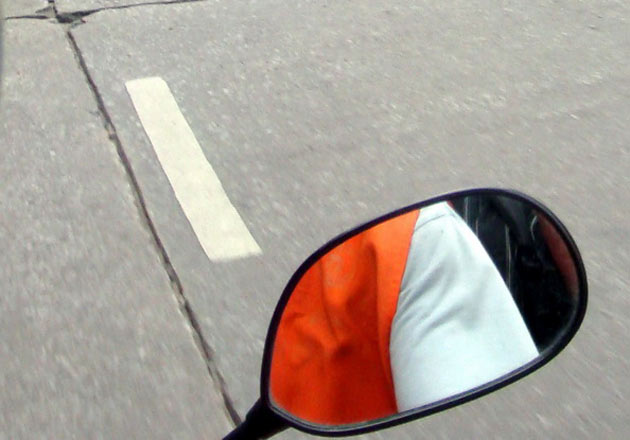 This is a shot taken on the back of a motorcycle taxi in Bangkok