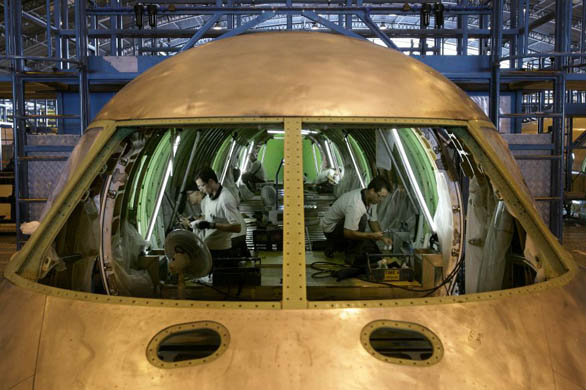 Technicians at the Embraer aircraft factory