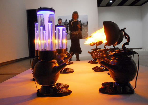 Olaf Breuning installation titled Fire Against Water (2008)