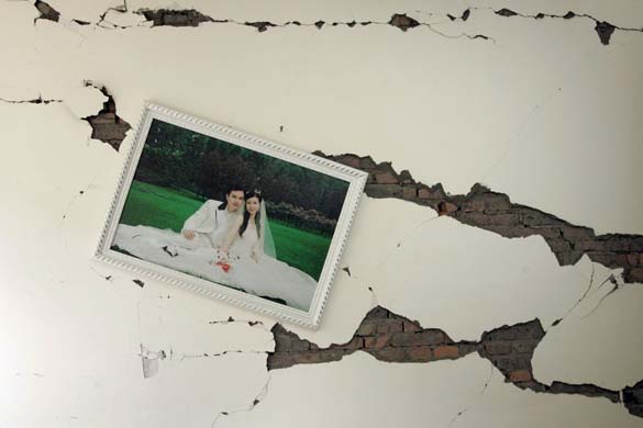 Photo on cracked wall, due to earthquake: Sichuan province, China