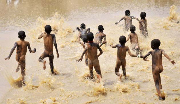 Children play in water