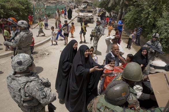 Soldiers and civilian in Iraq