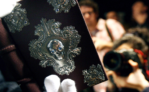 Photographers at Sotheby's at the press view of The Tale of Beedle the Bard