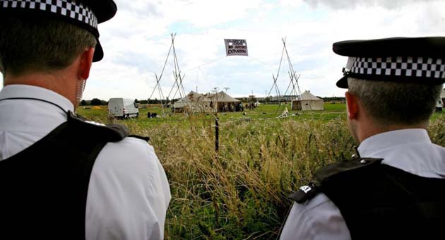 Police officers look on 