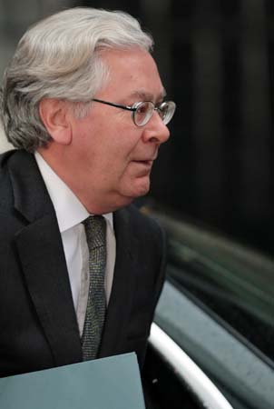 Governor of the Bank of England Mervyn King arrives at 10, Downing Street