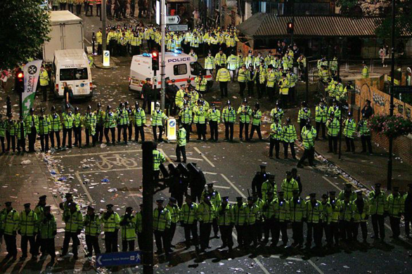 Police clash with a group of around 40 people 