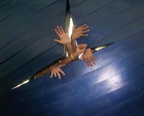 Hands through wall by Maher, 16, from Egypt