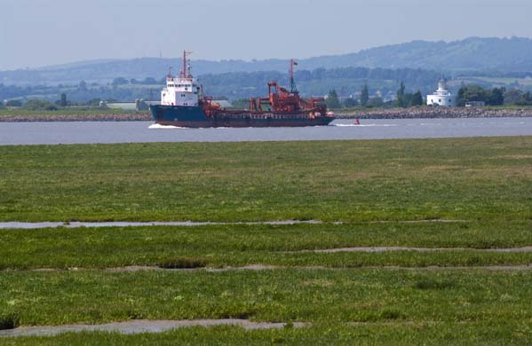 Sand dredger off Newport wetlands