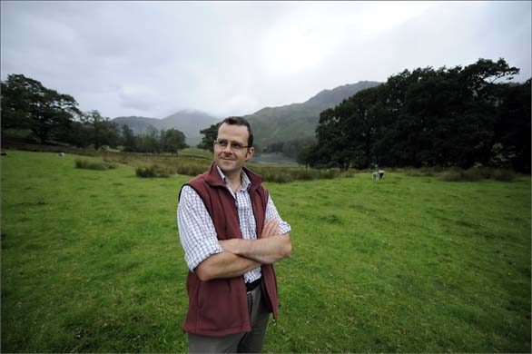Neil Johnson with Herdwick sheep