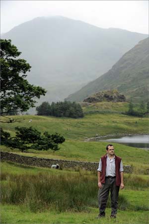 Neil Johnson with Herdwick sheep