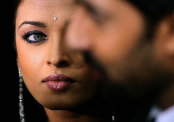 Aishwarya Rai listens to her husband Abhishek Bachchan  