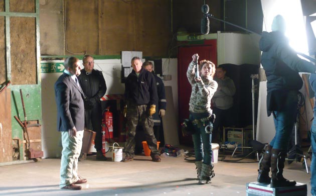 An actor prepares for his shot