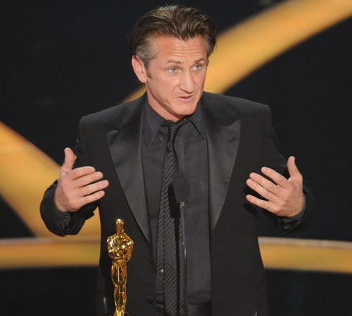 Sean Penn accepts the best actor award for his work on Gus Van Sant's Milk