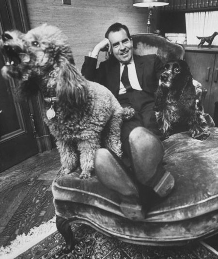 Nixon with his poodle Vickie and cocker spaniel Checkers in 1964
