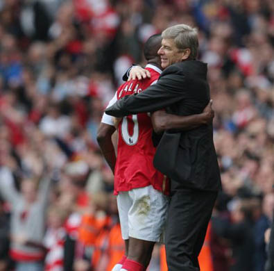 Arsenal manager Arsene Wenger celebrates the last minute equalising goal with scorer William Gallas