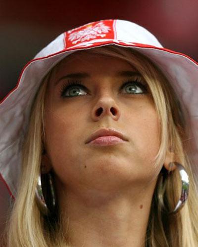 A Poland fan before kick off at the Hypo-Arena. Photograph: Mike Egerton/Empics/PA