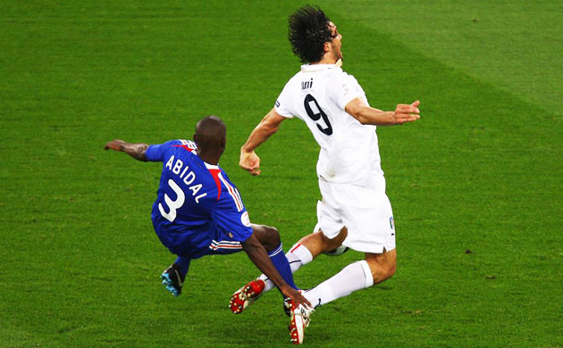 Abidal brings down Toni