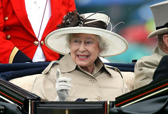 The Queen arrives at Ladies' Day by carriage