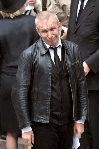 Jean Paul Gaultier gestures at the funeral mass for YSL in Paris 