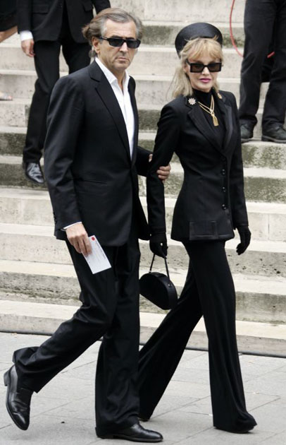 Philosopher Bernard Henri Levy and actress Ariel Dombasle arrive for the funeral of YSL in Paris 