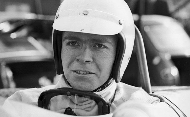 Mosley behind wheel of race car