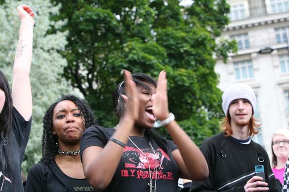 Emo demonstrators clapping and chanting
