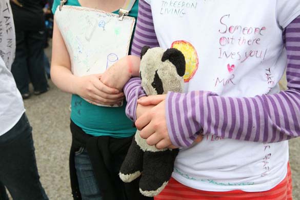 Emo demonstrators holding placards