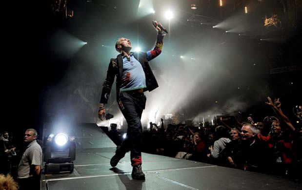 Chris Martin from Coldplay performs