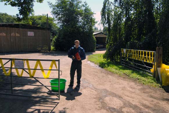 A bowl of disinfectant at the entrance to Woolfords Farm
