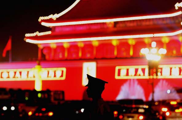 A policeman guards Tiananmen Square