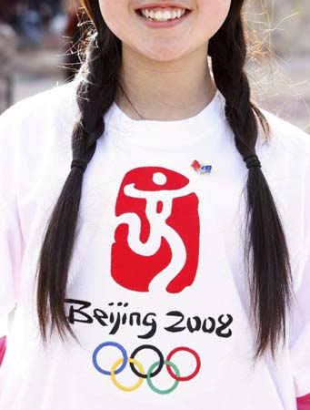 A girl wears a Beijing Olympics T-shirt