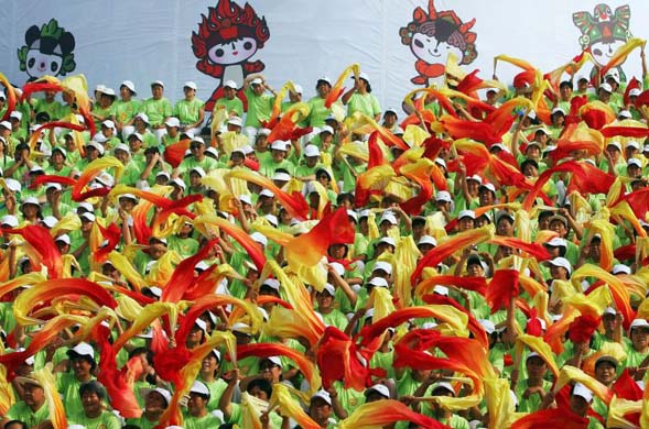 Beijing citizens wave ribbons