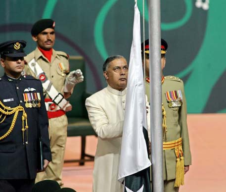 rime Minister Shaukat Aziz hoists the national flag