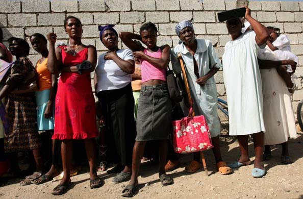 Residents wait for free medical attention outside the Saint Spirit medical centre