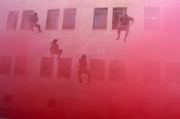 Members of Mahmoud Abbas' security force in action