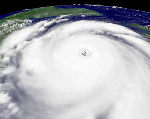 A satellite image showing Hurricane Dean intensifying into a category 4 storm in the Atlantic