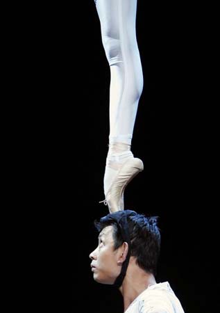 Contortionists from the Chinese Zunyi Acrobatic Troupe