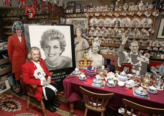 Margaret Tyler with some of the estimated 2000 - 3000 items of Diana memorabilia in her home