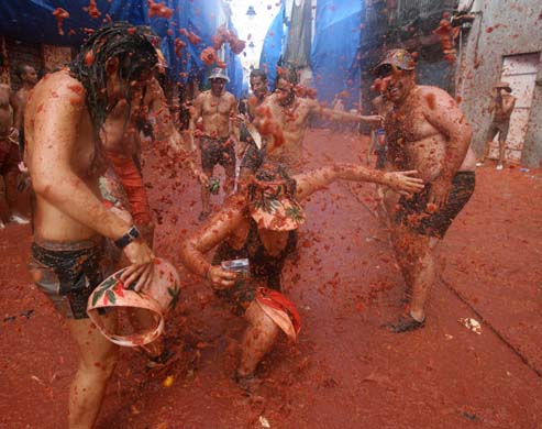 People throwing tomatoes