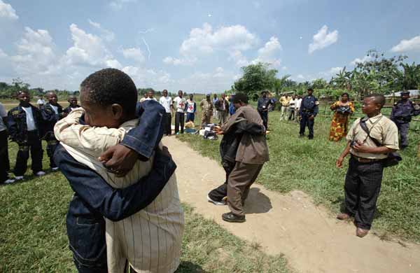 Former child soldiers are greeted by their parents