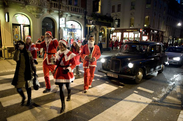 Santacon flash mob event in Soho