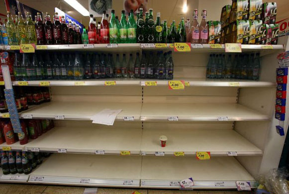 Empty bottled water shelves