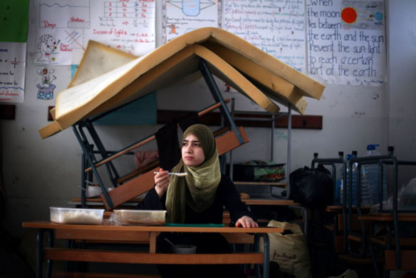 A Palestinian girl who fled her home