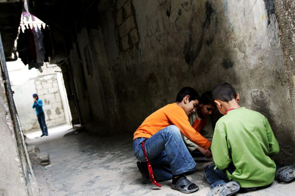 Boys play in the street