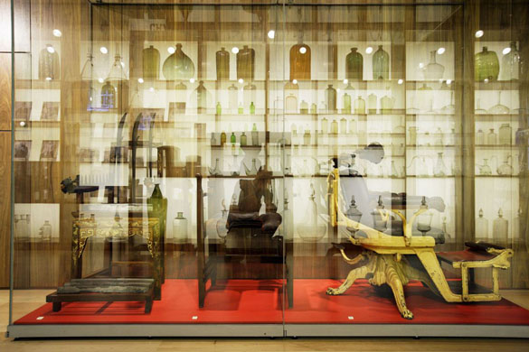 Reflections of bottles and chairs